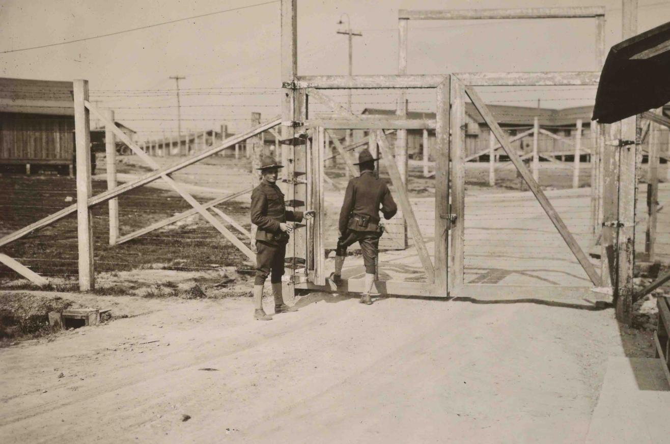 Photograph of guards standing at the main gate to Fort Olgethorpe